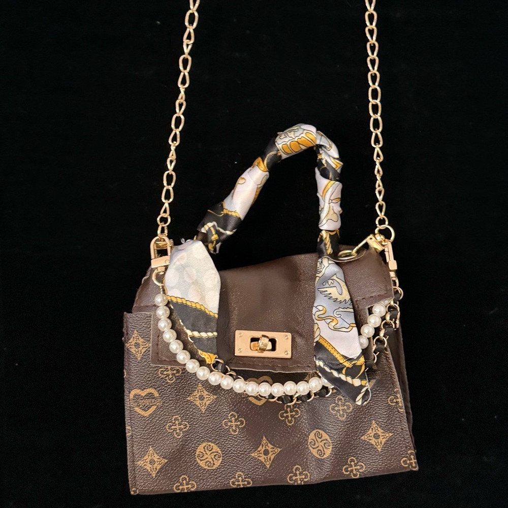 Elegant Brown Designer Handbag with Gold Accents